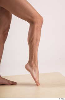 Colin  1 calf flexing nude side 0003.jpg